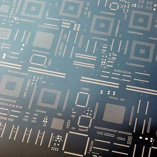 Close-up of laser-cut apertures in a stainless steel SMT stencil